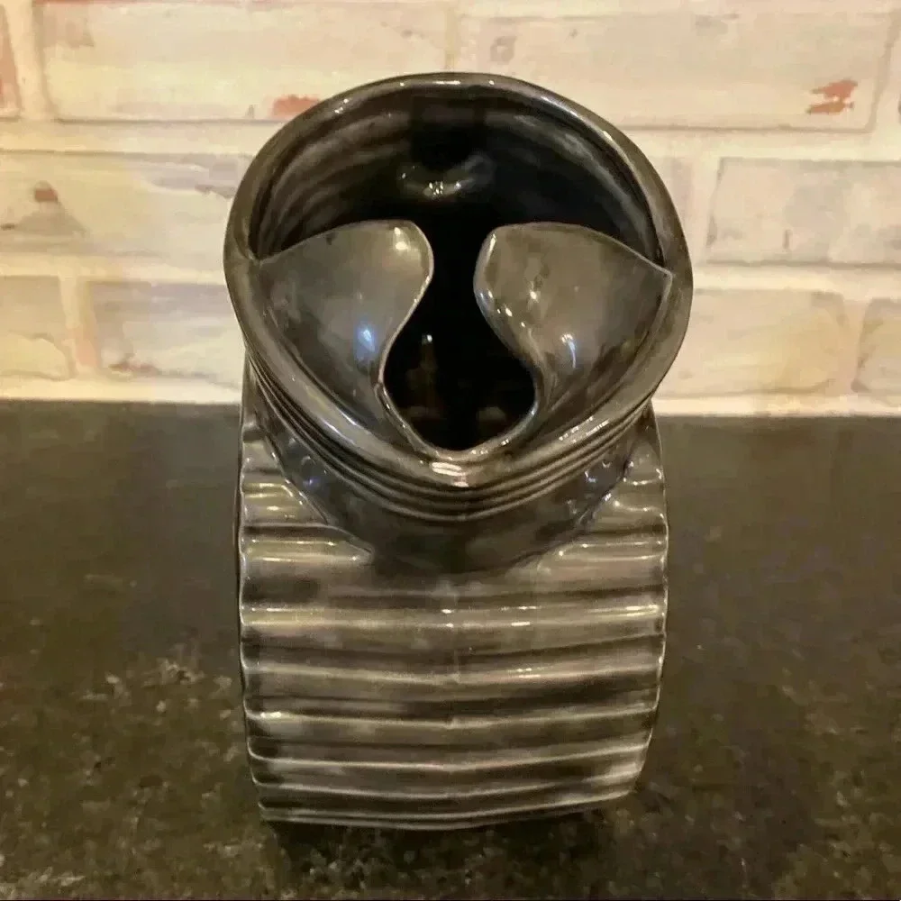 N/A tilted pitcher